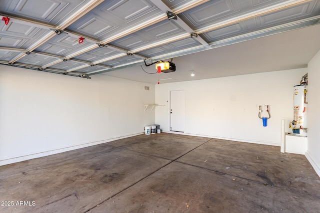 garage featuring a garage door opener and gas water heater