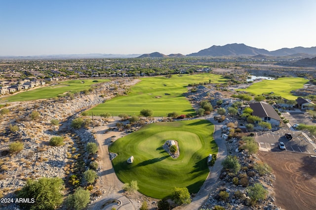 birds eye view of property featuring a mountain view