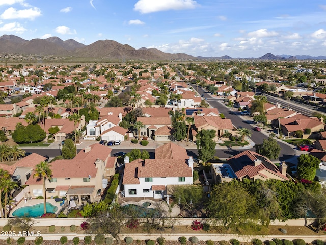 bird's eye view featuring a residential view and a mountain view