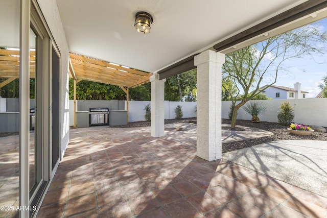 view of patio with a fenced backyard and a pergola