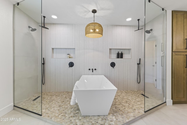 bathroom with a soaking tub, recessed lighting, walk in shower, and tile patterned floors