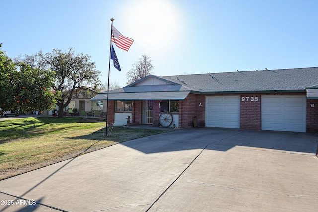 single story home featuring a front yard and a garage