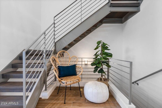 stairs with wood-type flooring