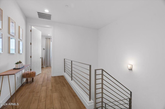 hallway featuring hardwood / wood-style flooring