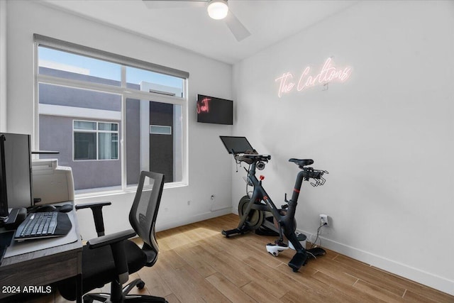 office featuring light wood-type flooring and ceiling fan