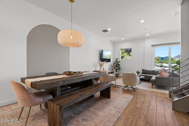 dining space featuring hardwood / wood-style floors