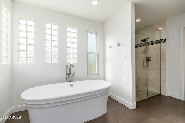 bathroom with independent shower and bath