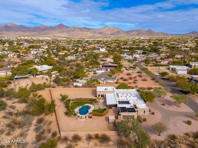 birds eye view of property featuring a mountain view