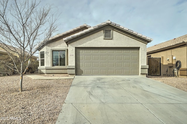 ranch-style home with a garage