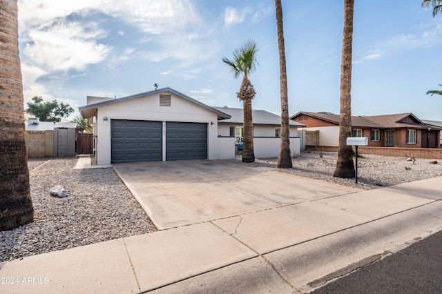 ranch-style home with a garage