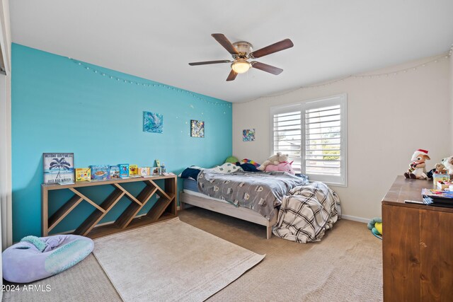 bedroom with carpet flooring and ceiling fan