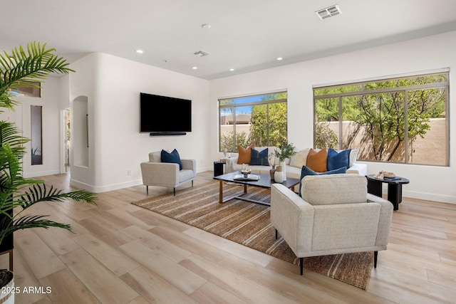 8227 E Beardsley Rd, Scottsdale, AZ 85255 - living area featuring light wood-style flooring, baseboards, visible vents, and recessed lighting