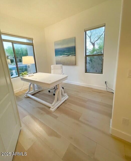 8227 E Beardsley Rd, Scottsdale, AZ 85255 - office area with light wood-style flooring and baseboards