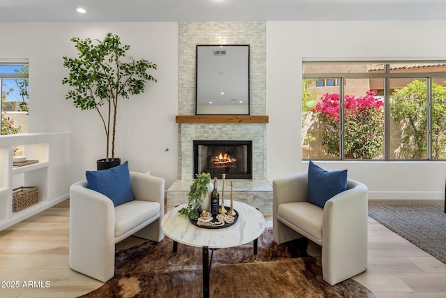 8227 E Beardsley Rd, Scottsdale, AZ 85255 - living area featuring recessed lighting, a brick fireplace, and baseboards