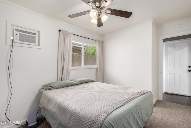 bedroom with a ceiling fan, carpet flooring, a wall unit AC, and ornamental molding