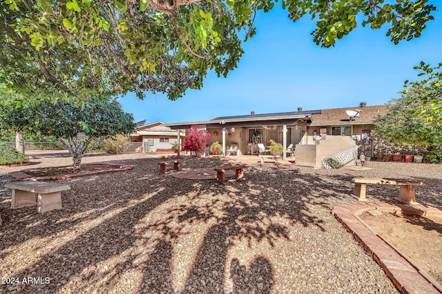 back of property featuring a patio area