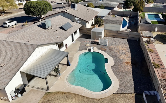 view of pool featuring a patio