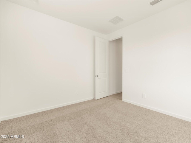 spare room with carpet