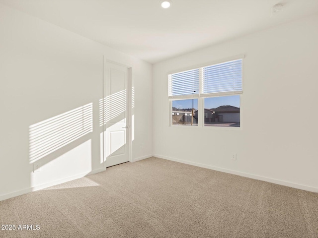 empty room with light carpet