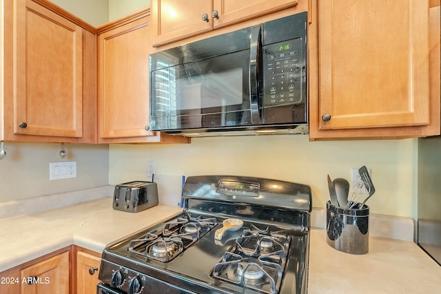 kitchen with black appliances