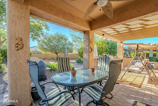 view of patio with ceiling fan