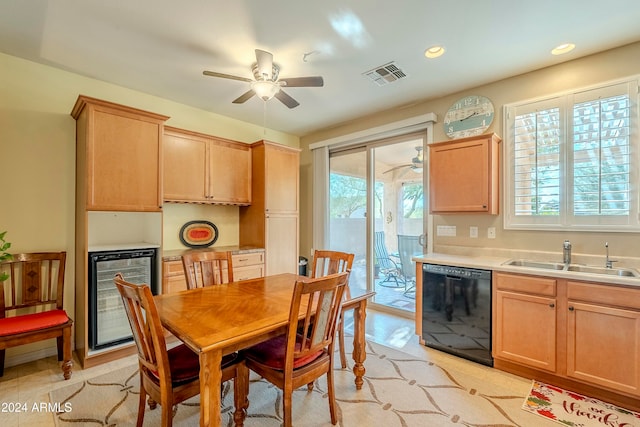 tiled dining space with wine cooler, ceiling fan, sink, and a healthy amount of sunlight