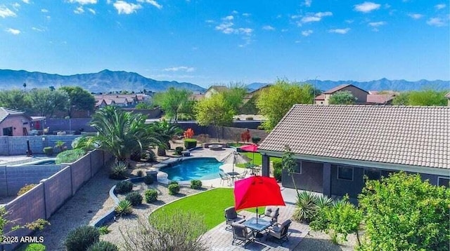6731 S 37th Dr, Phoenix, AZ 85041 - view of swimming pool featuring a mountain view, a fenced backyard, and a patio area