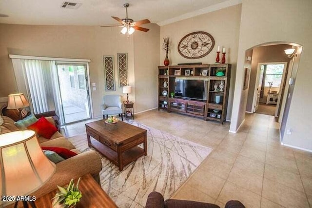 6731 S 37th Dr, Phoenix, AZ 85041 - tiled living area with arched walkways and a ceiling fan