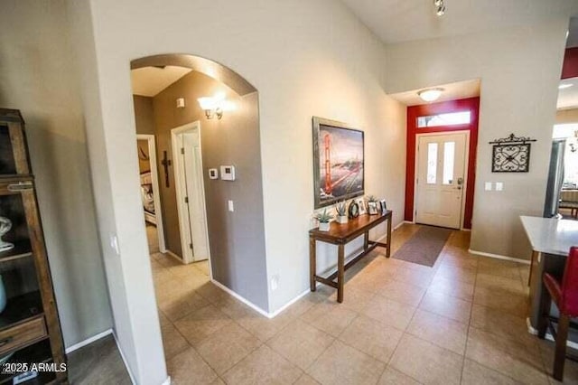 6731 S 37th Dr, Phoenix, AZ 85041 - foyer with arched walkways and tile patterned floors