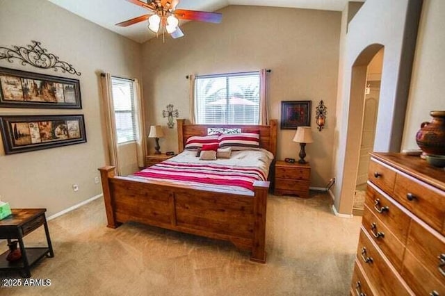 6731 S 37th Dr, Phoenix, AZ 85041 - bedroom with light colored carpet, arched walkways, lofted ceiling, and ceiling fan