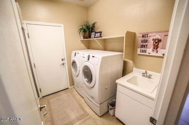 6731 S 37th Dr, Phoenix, AZ 85041 - laundry room featuring independent washer and dryer and light tile patterned flooring