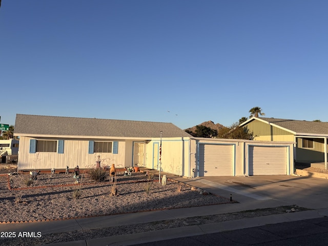 111 W 9th St, Ajo, AZ 85321 - view of front of home with a garage and concrete driveway