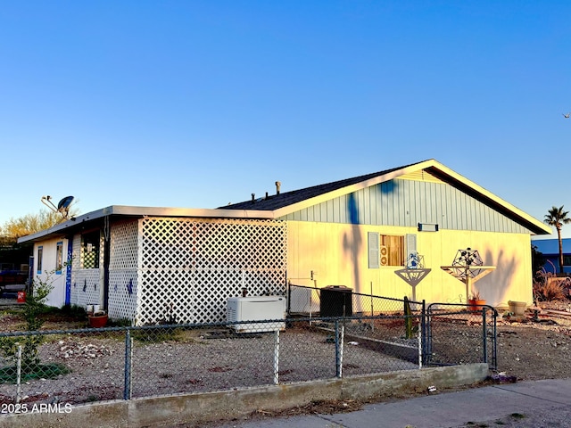 111 W 9th St, Ajo, AZ 85321 - view of front facade featuring central AC unit