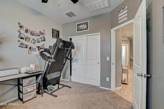 office space featuring visible vents, carpet flooring, and baseboards