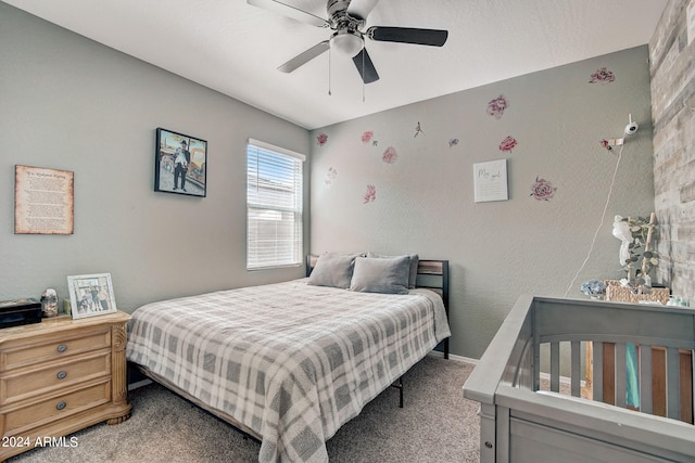 bedroom with baseboards, light carpet, and a ceiling fan