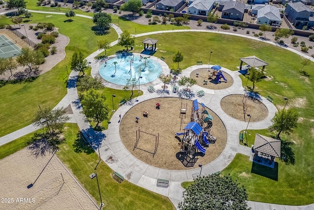 birds eye view of property with a residential view