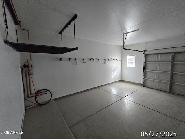 43455 W Chisholm Dr, Maricopa, AZ 85138 - garage featuring baseboards