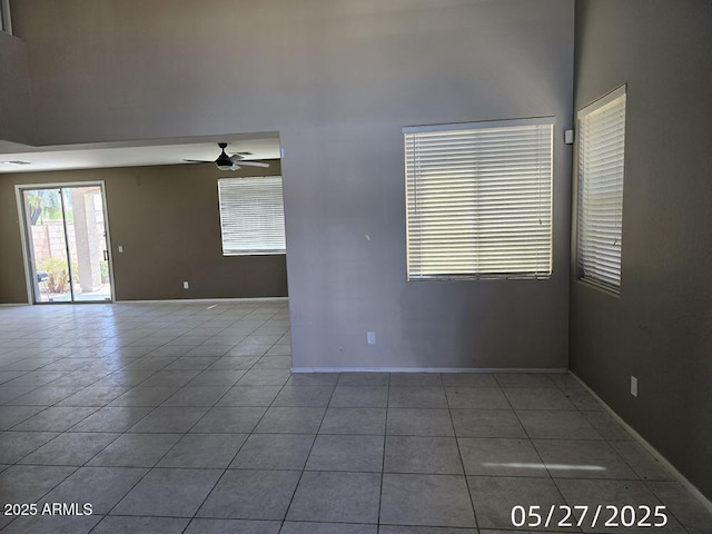43455 W Chisholm Dr, Maricopa, AZ 85138 - tiled empty room with ceiling fan and baseboards