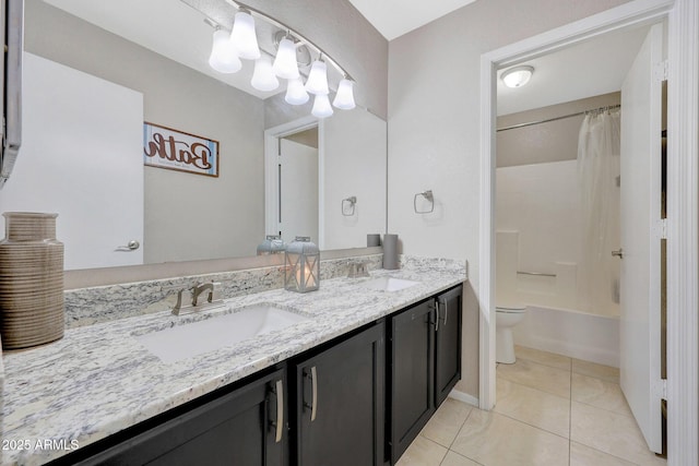 full bathroom with vanity, tile patterned floors, shower / bath combo with shower curtain, and toilet