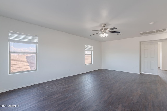 30944 N Bramwell Ave, San Tan Valley, AZ 85143 - empty room featuring baseboards, a ceiling fan, dark wood-type flooring, and visible vents