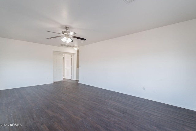 30944 N Bramwell Ave, San Tan Valley, AZ 85143 - unfurnished room with ceiling fan, visible vents, baseboards, and dark wood-type flooring