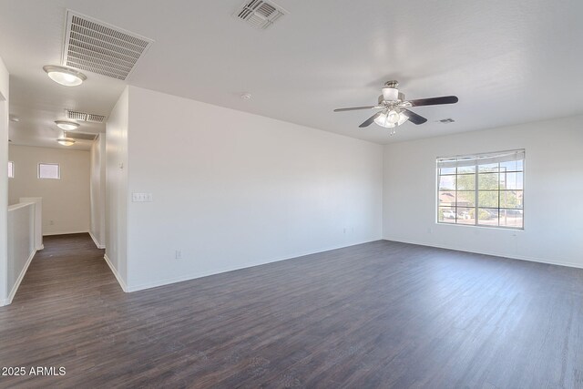 30944 N Bramwell Ave, San Tan Valley, AZ 85143 - unfurnished room with dark wood-style flooring and visible vents