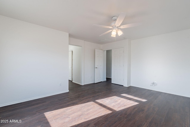 30944 N Bramwell Ave, San Tan Valley, AZ 85143 - unfurnished bedroom with baseboards, ceiling fan, dark wood-style flooring, and visible vents