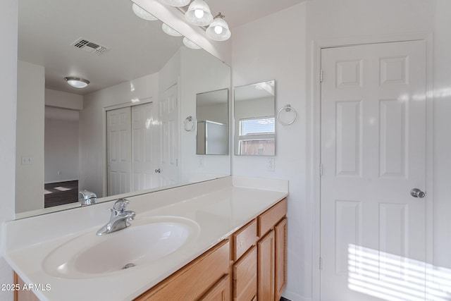30944 N Bramwell Ave, San Tan Valley, AZ 85143 - bathroom featuring visible vents and vanity