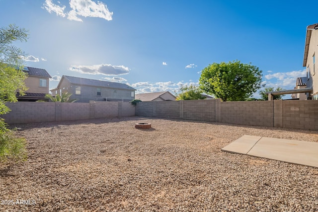 30944 N Bramwell Ave, San Tan Valley, AZ 85143 - view of yard with a patio, a fire pit, and a fenced backyard