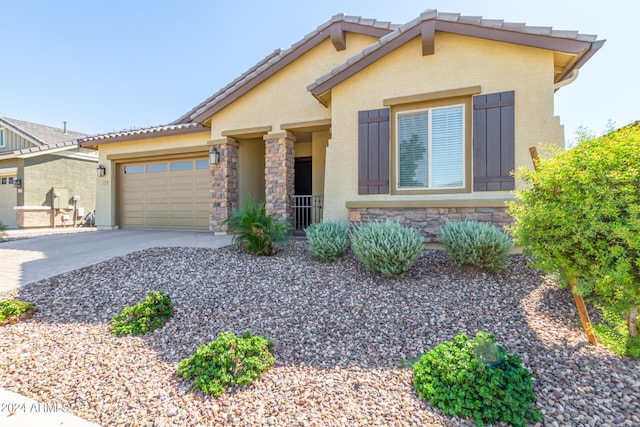 view of front of property with a garage