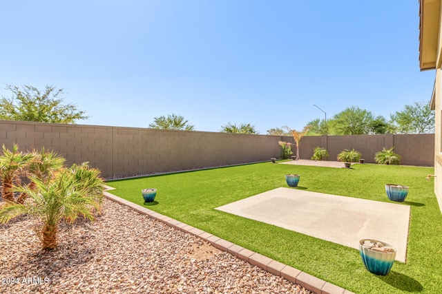 view of yard with a patio area