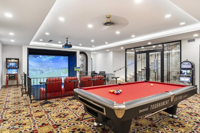 playroom with a raised ceiling, ceiling fan, and pool table