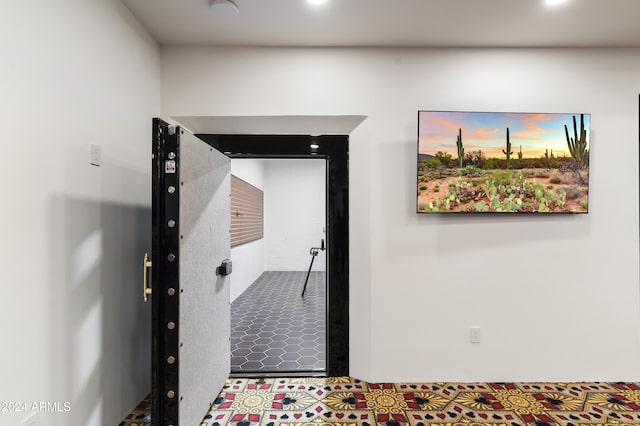 hall featuring tile patterned floors