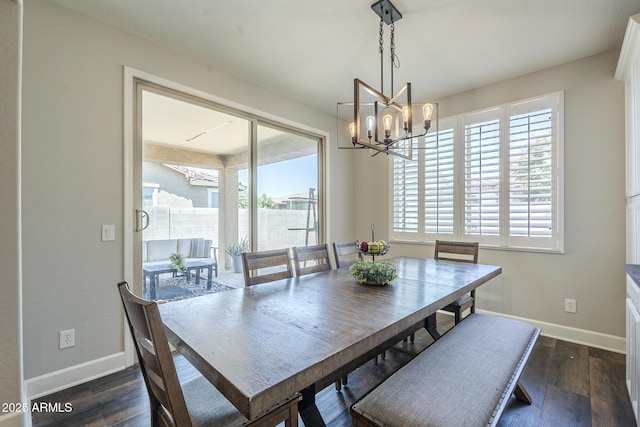 9752 E Torino Ave, Mesa, AZ 85212 - dining room with baseboards, a chandelier, and dark wood-type flooring